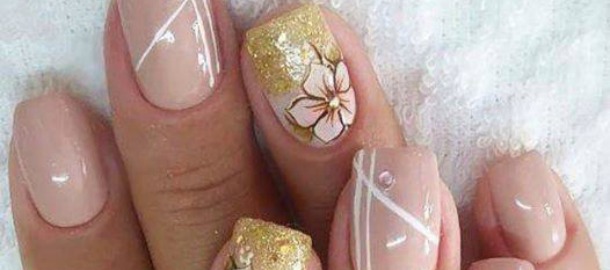 Nail art, le tendenze dell'estate 2015: fantasie e dettagli preziosi sulle unghie